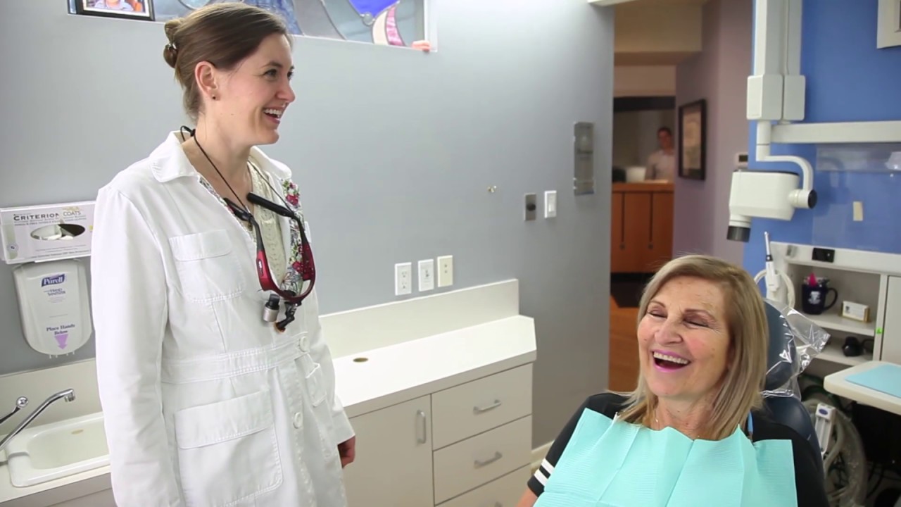 Schenectady dentist laughing with a patient