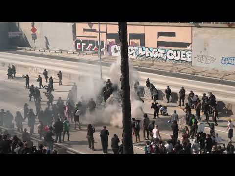 Video Thumbnail: Arrests, tear gas as Los Angeles protesters face police under highway bridge | AFP
