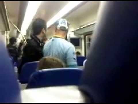 Feyenoord supporters in de trein.