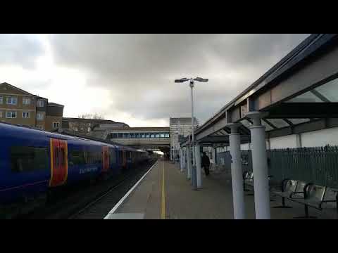 444033 Passing Feltham.