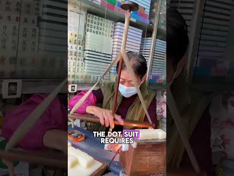 Last Female Mahjong Carver in Hong Kong hand carved and hand paints mahjong tiles.