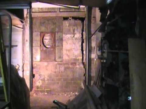 Car crashing through  brick wall in Madison