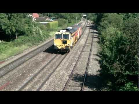 COLAS TAMPER DR73931 PASSES CLODDY BRIDGE IN THE SUN 080912