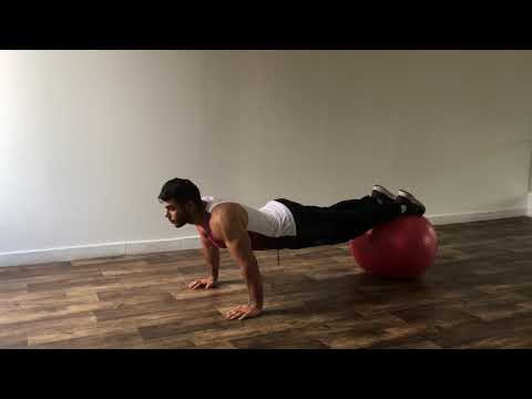 ضغط بالكرة السويسرية  - push ups with feet on an exercise ball