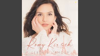 Kadr z teledysku La vie en rose tekst piosenki Romy Kirsch