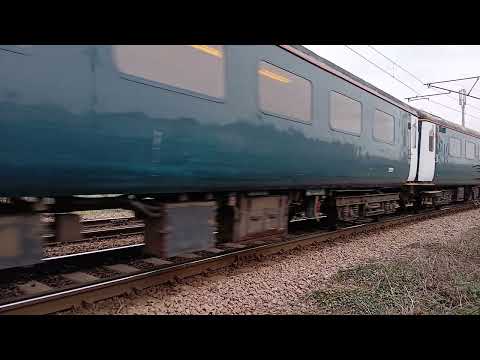 37407"Blackpool Tower" leads with 7 MK2 ERS & 20007/20205 on the rear pass thorpe junction--29/12/25