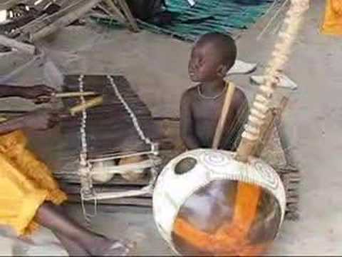 2 year old Gambian jali plays kora & balafon