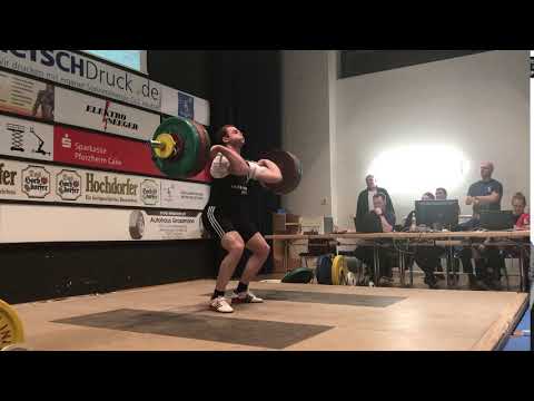 153 kg
