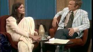 Margot Kidder reads a quote from Joan Garrity video