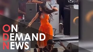 Cardi B THROWS Mic At Fan Who Hurls Drink At Her On Stage