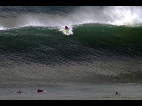 Surfers take on huge waves. Bells Beach, Victoria. June 24th 2017. Music by Them Crooked Vultures.