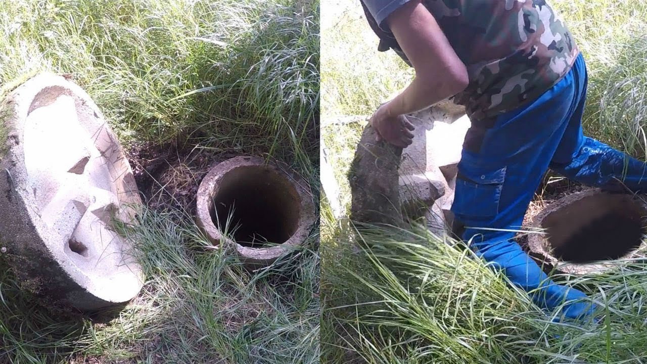канализационный люк в лесу. открытый люк в траве. люк-мина. что за люки в поле. канализационный люк в поле.