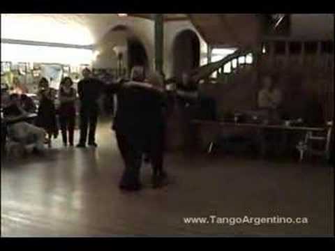  Mary Ann Casas  and  Oscar Casas  are  dancing  to  the  milonga  "  Que Tiempo Aquel  "