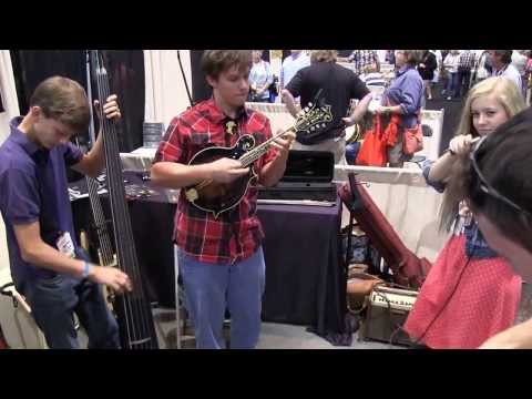 2013 IBMA Jam of Sally Goodin   Trying out some electric instruments at the NS Design Booth   SkyDri