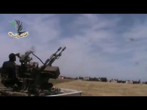 التصدي للطيران الحربي في قرية الضبعة في ريف حمص بواسطة رشاش 23  من قبل كتيبة الحمزة أسد الله