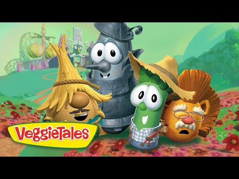 Group of VeggieTales characters posing in a bright, whimsical garden with the VeggieTales logo in the foreground.