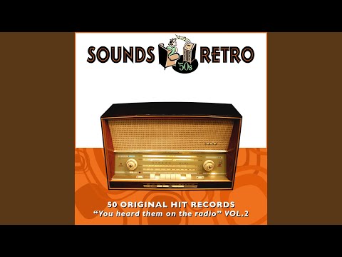 She Wears Red Feathers