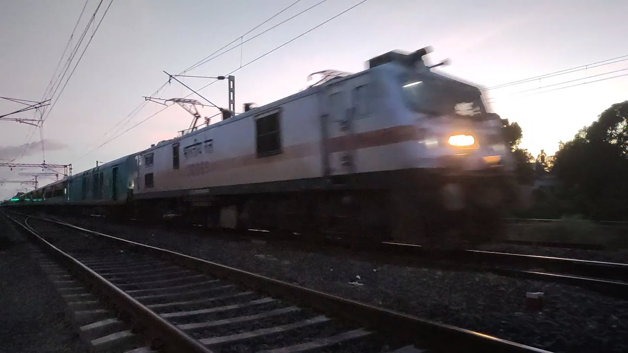 Watch video 15959/Kamrup Express (via Guwahati) Passing Chuchura With RPM WAP7#37069. Now 15959/Kamrup Express (via Guwahati) Passing Chuchura With RPM WAP7#37069.