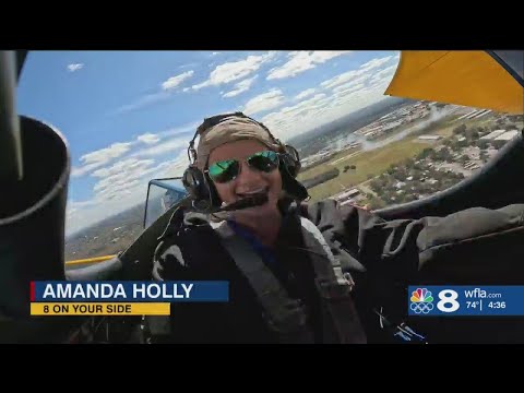 Amanda rides in a stearman biplane