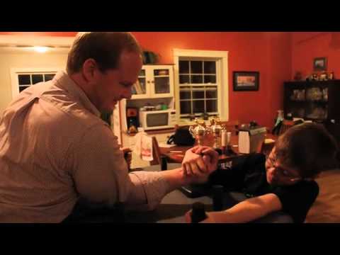 Charlie McGeoghegan and son Stephen arm wrestle