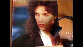 PHIL CARMEN. The Key