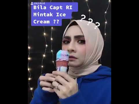Zizi kirana makan Aiskrim