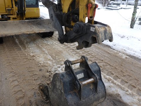 How to use cat mini excavator quick coupler