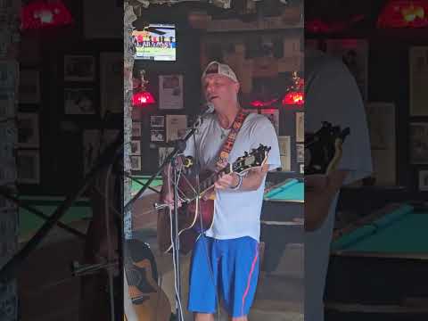 Kenny Chesney  stopped into Captain Tony's Saloon in Key West. Sings "You and tequila make me crazy"