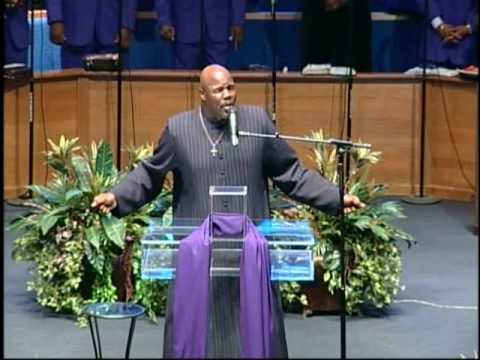 pastor sings by the grace of God