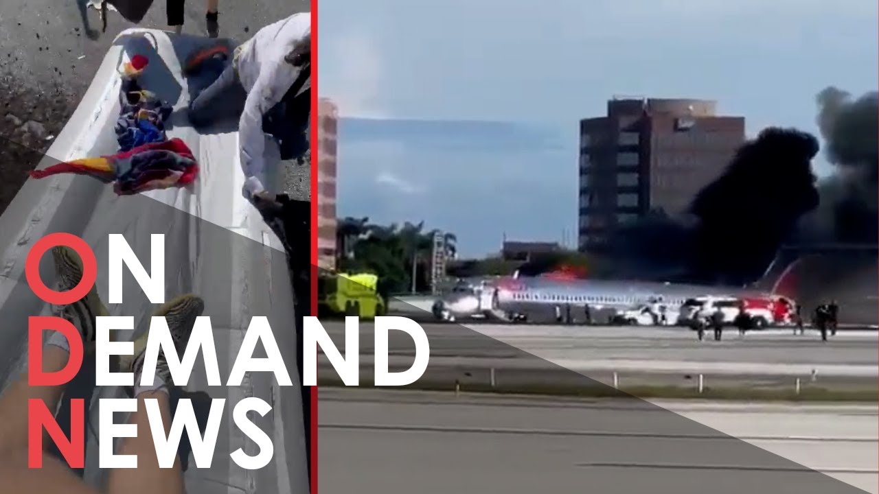 Passenger Films TERRIFYING Evacuation From Burning Jet