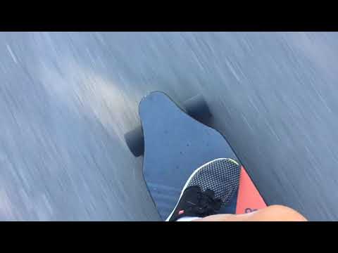 Riding my new electric skateboard very fast!!!