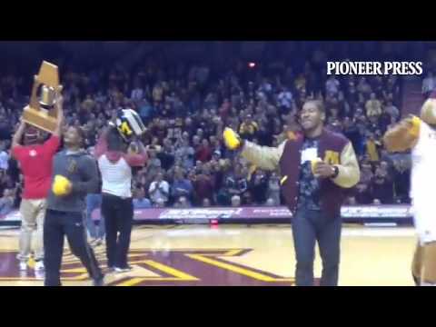 #Gophers football players show off their trophies in the first half of basketball game vs. North Dak