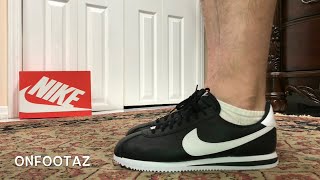 nike cortez white black on feet