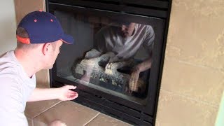 How open & remove to clean the glass cover on a GAS FIREPLACE