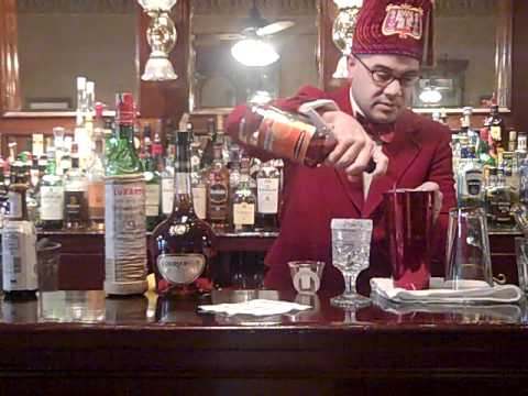 Chris Hannah at French 75 making the Brandy Crusta