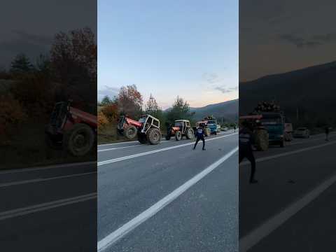 3 TRACTORS PULLING THE TRUCK