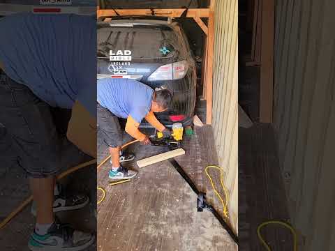 Nailing the wood in place