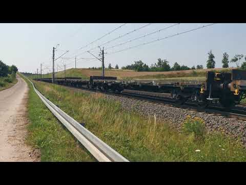 Mijanka ET22-692 z długim składem platform i EP09-012 z TLK Lubomirski Gdynia Gł. - Przemyśl Gł.