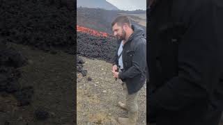 Bare hand touching Iceland lava flow #volcano #lava #burn #iceland #fire #lavaflow #stupid #funny