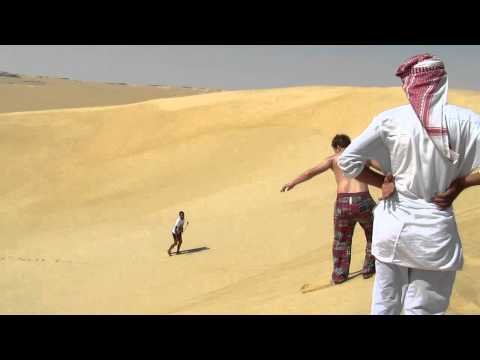 Sandboarding in Siwa, Egypt