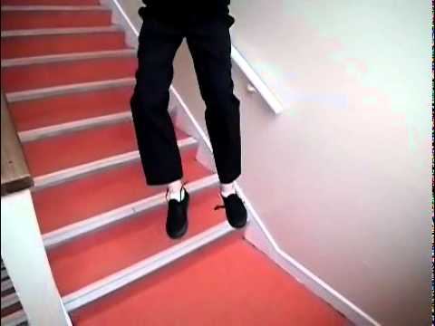Felix Jumping Down Some Stairs in Slow Motion