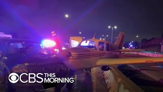 Plane hits SUV during emergency landing on highway