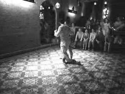  Murat Erdemsel  and  Mariana Galassi  are  dancing  to  the  tango  "  Una Emocion  "