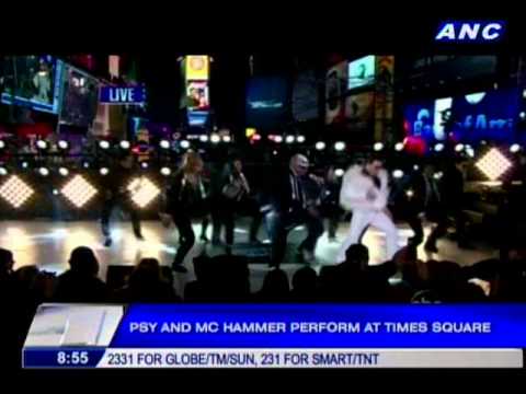 Psy and MC Hammer perform mash-up at Times Square