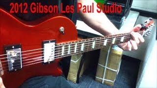 Video thumbnail for Gibson Les Paul Studio Nitrous Orange Electric Guitar How to Stretch Strings Properly by Sammy Bones