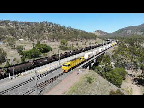 Aurizon 2849 leading a Linfox container freight through Yarwun on its way south.