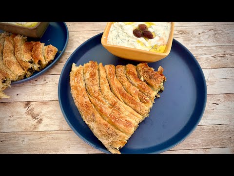 Stretching phyllo dough layers by hand like our grandmas did (for Albanian byrek)