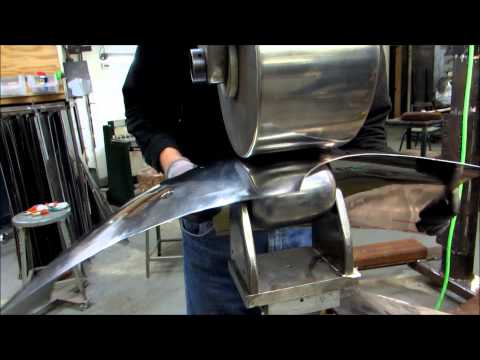 Part 4 Wray Schelin rolls a Jaguar E-Type fender on an English wheel