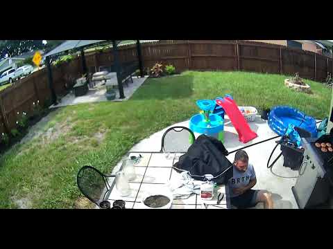 Man Gets Scared and Falls While Igniting Grilling Machine in Garden - 1130663