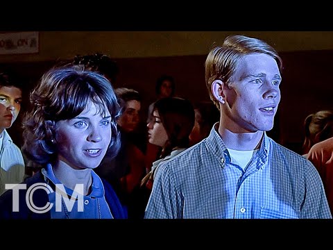 Thumbnail of the video: Steve Bolander and Laurie Henderson Lead Off the Snowball Dance | American Graffiti (1973) | TCM